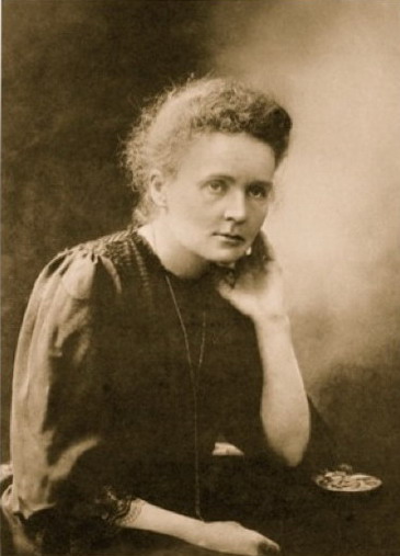 Marie Curie-Sklodowsk na oficiln fotografii (1911) pi pleitosti udlen Nobelovy ceny
